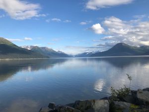 Alaskan lakeside with mountains