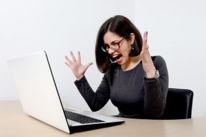 woman frustrated with computer